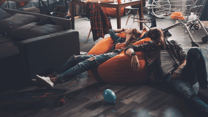 Two people after a party passed out on a beanbag