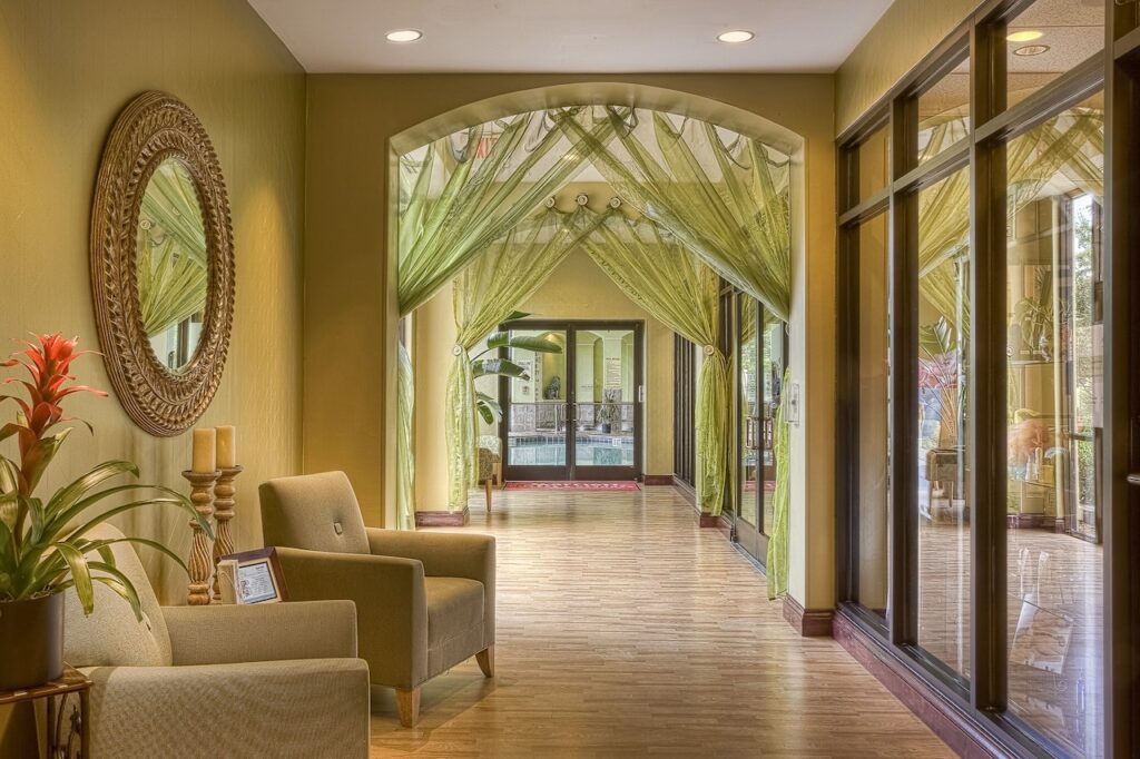 Beautiful green hotel lobby with curtains