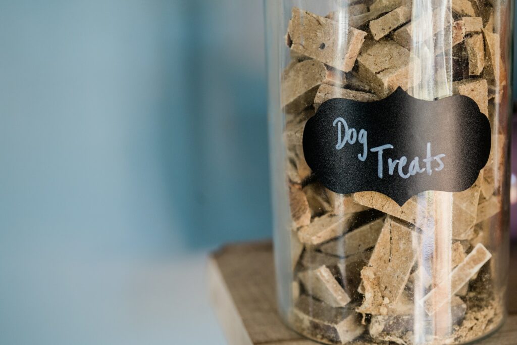A photo of a jar of dog treats