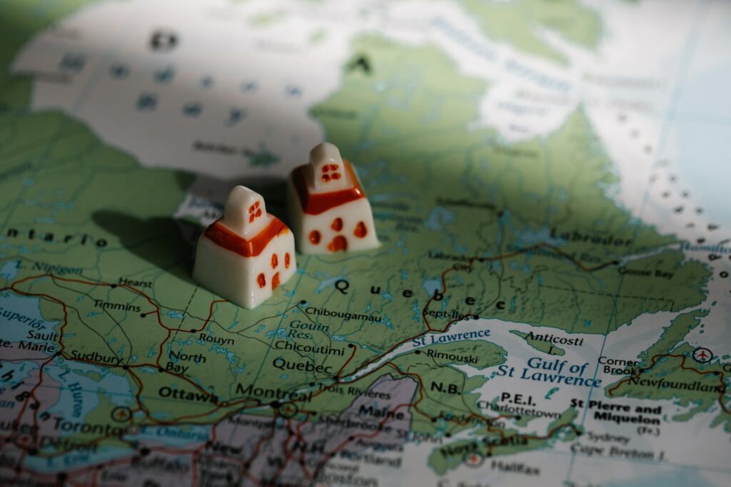 A photo of a map with two houses on it