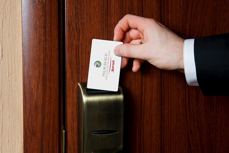 Image of a guest using a hotel key card