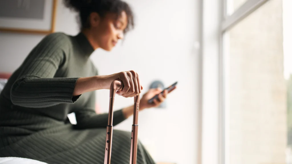 Person using an Airbnb Welcome Book on their phone